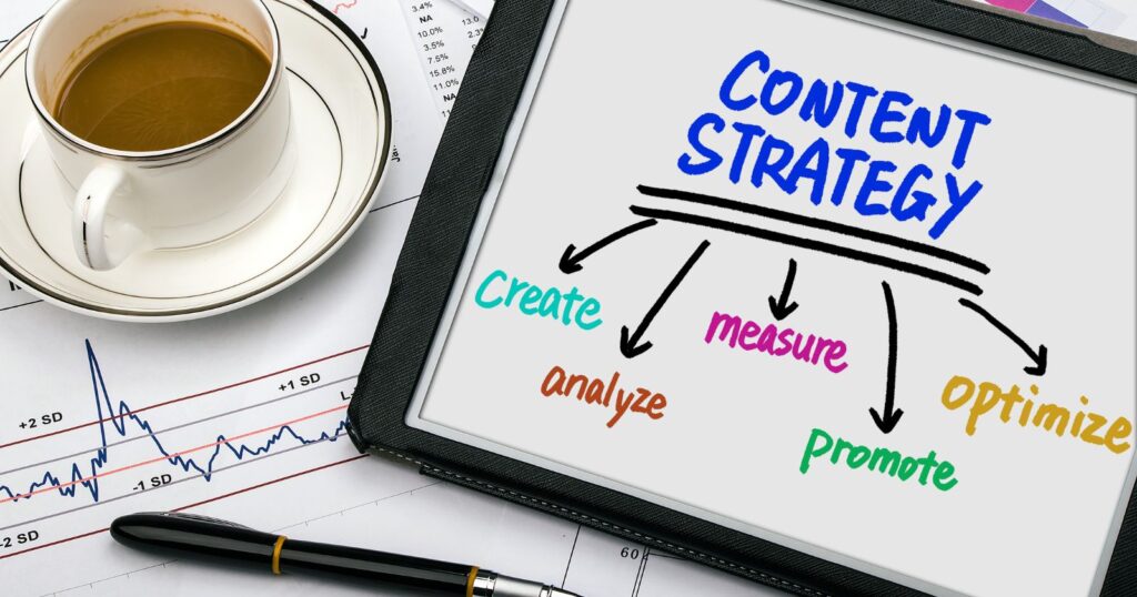 A tablet beside a coffee with illustration of content strategy.